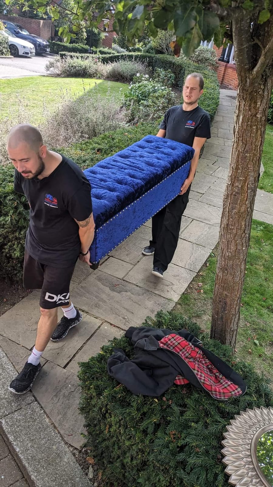 Sideline Removals team carrying furniture during a house move in Bromley, BR1
